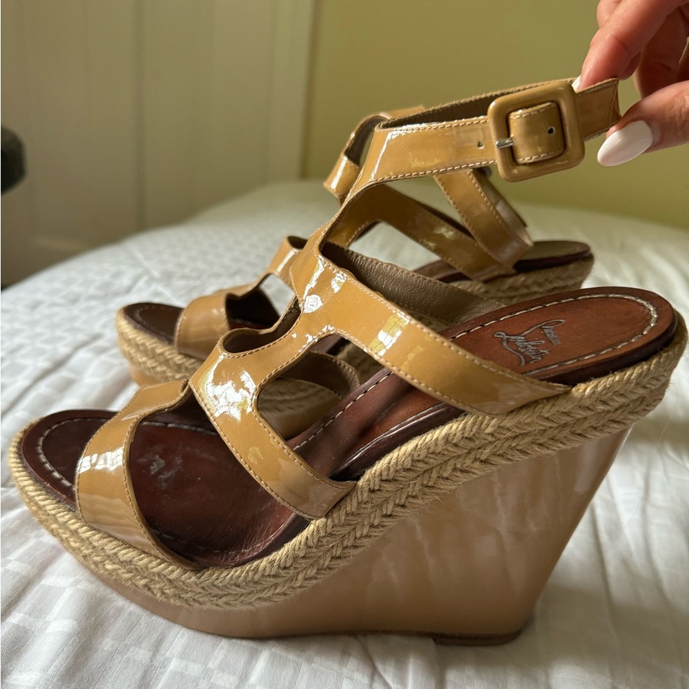 Christian Louboutin patent wedge sandals with 5” heel.
